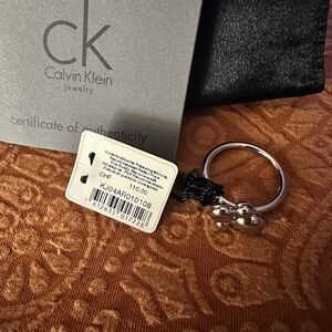 Calvin Klein Black and Silver Ring with Bold Design  (size 8)